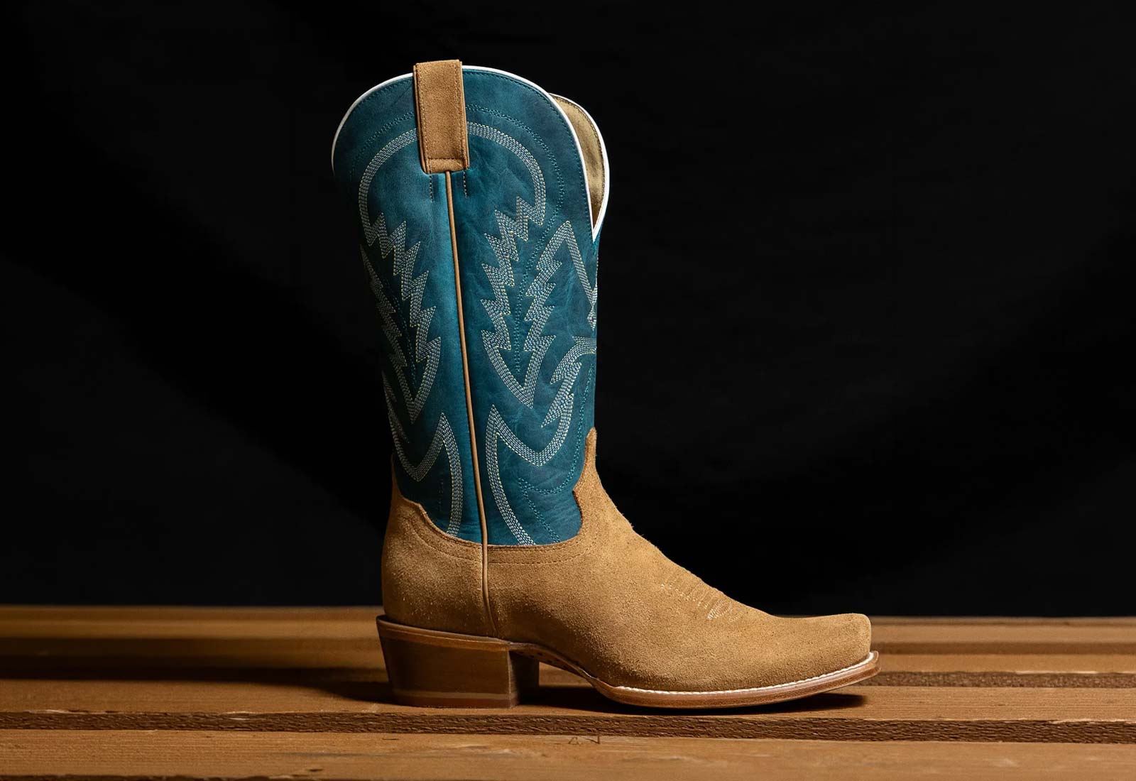 Featuring the Jax 13" Western Western boots in blue an tan.