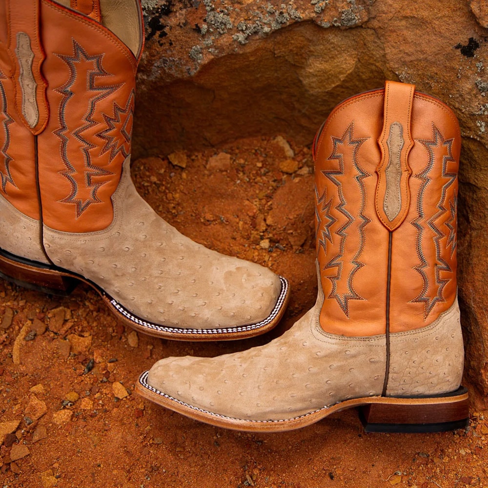 Featuring the Carlos 11" Full Quill Ostrich western boot in orange.