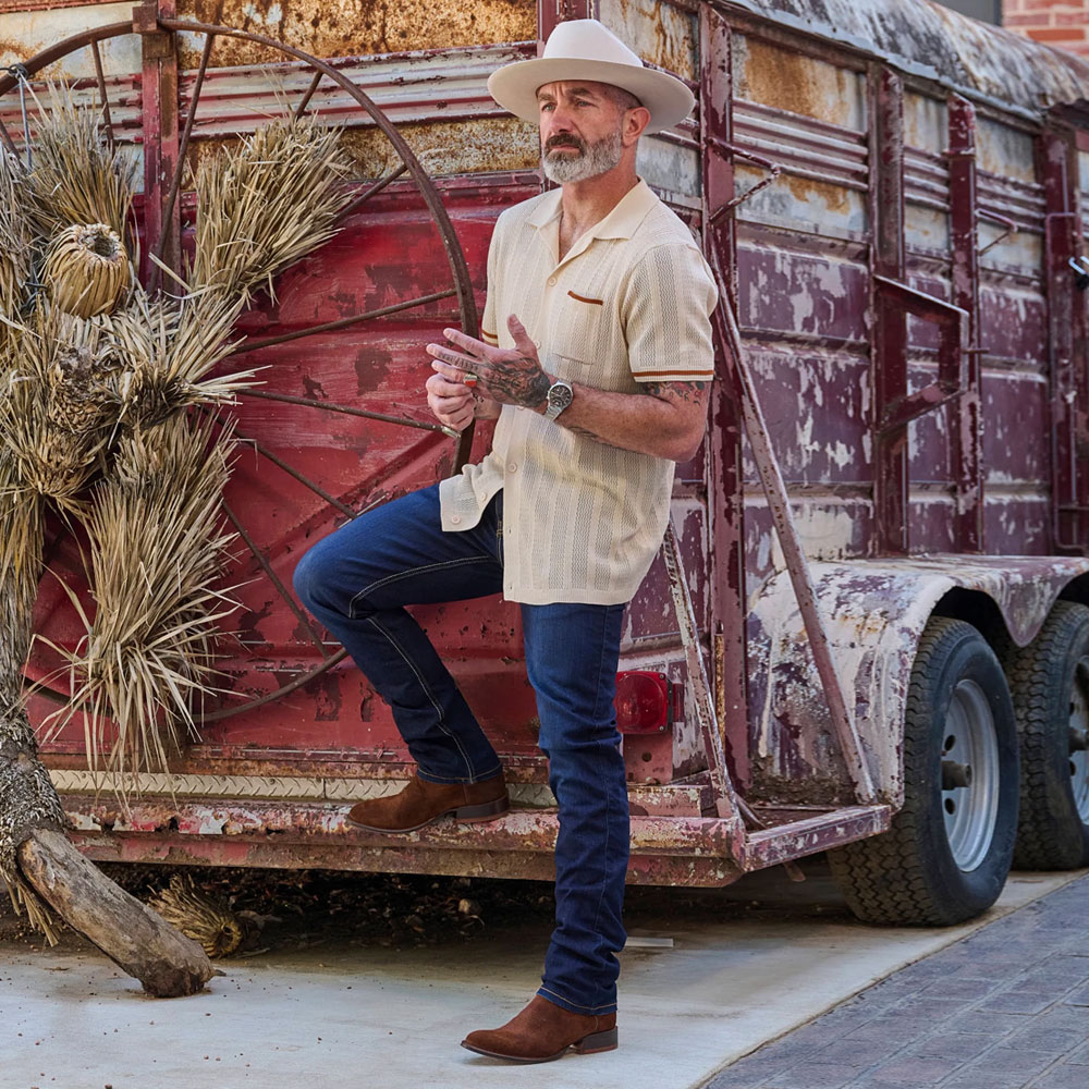 Featuring the Amado 12" Suede western boot in brown.