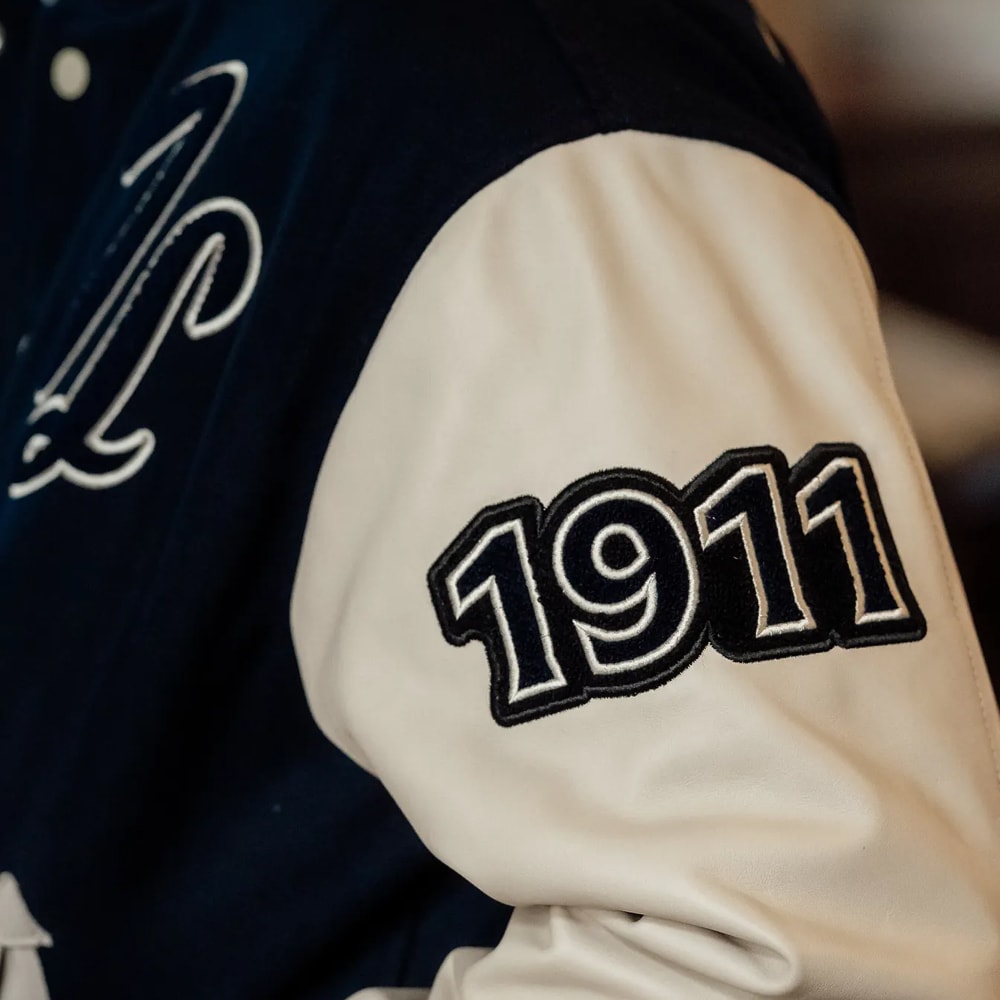 Featured Style: Men's varsity jacket in blue. Shop the Men's varsity jacket.