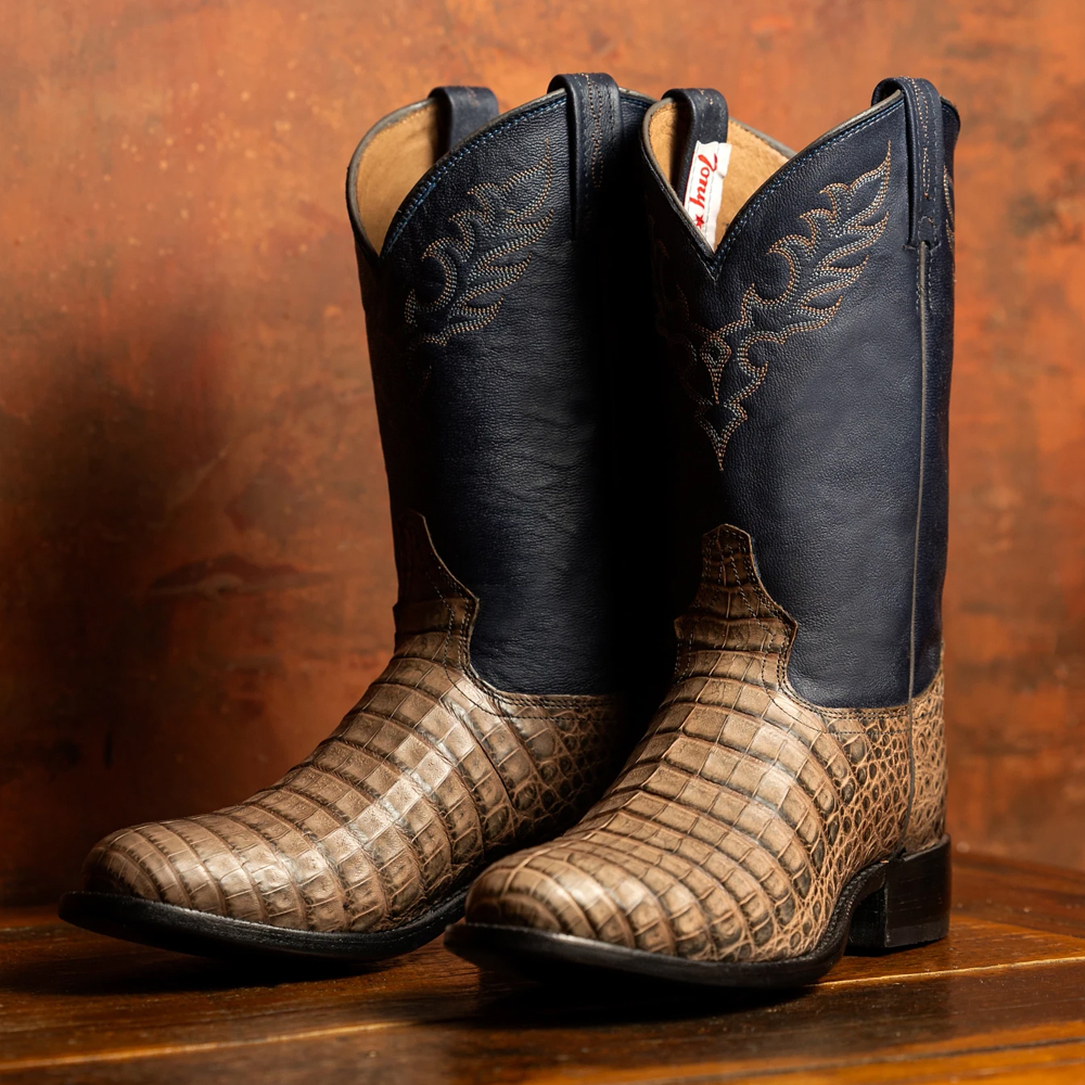 Featuring the Delmonte 11" Caiman boot in blue and tan.